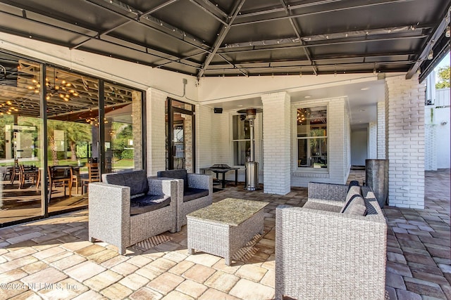 view of patio with a gazebo and an outdoor hangout area