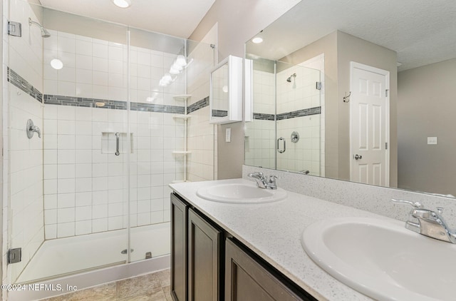 bathroom featuring vanity and walk in shower