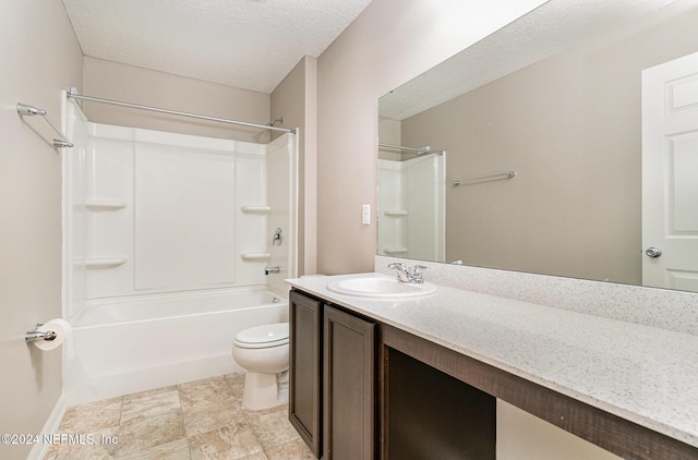 full bathroom with vanity, a textured ceiling, toilet, and tub / shower combination