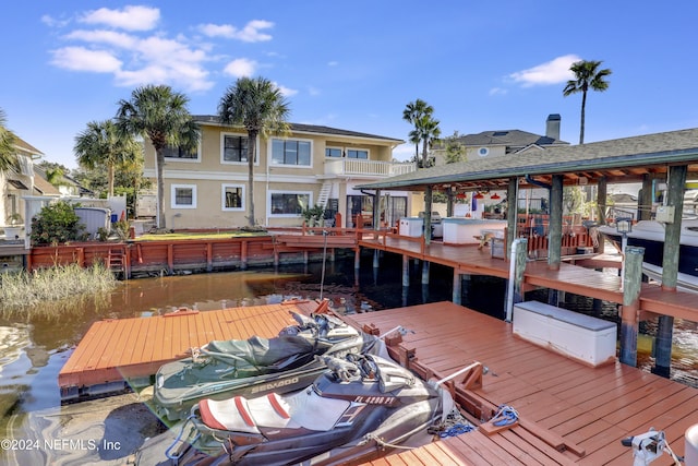 dock area featuring a water view