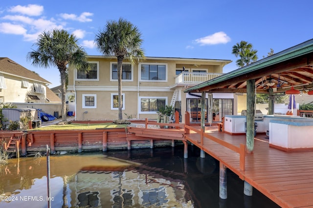 dock area with a balcony