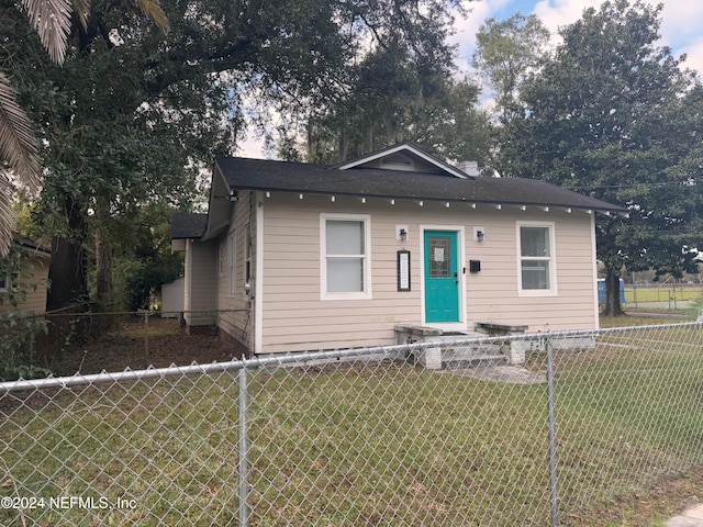 bungalow with a front yard