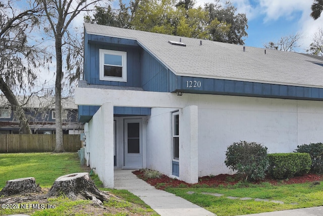 view of front of home with a front yard