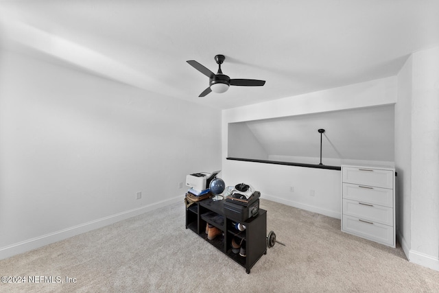 interior space featuring light carpet, ceiling fan, and lofted ceiling