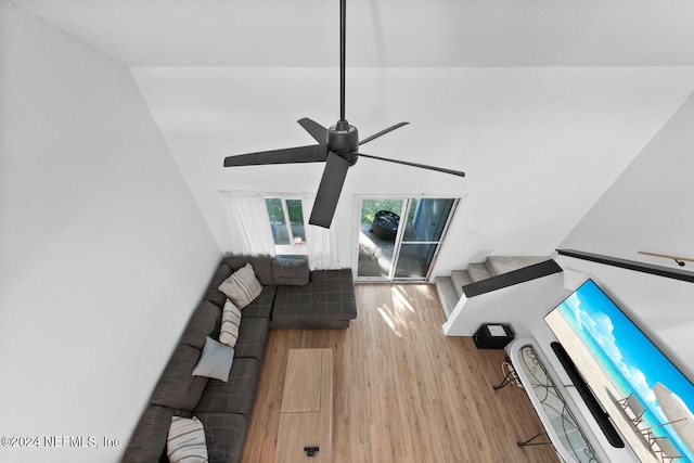 living room with ceiling fan and hardwood / wood-style floors