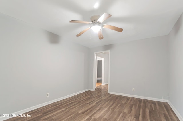 5813 Doeboy St, Jacksonville, FL 32208 - spare room with baseboards, wood finished floors, and ceiling fan