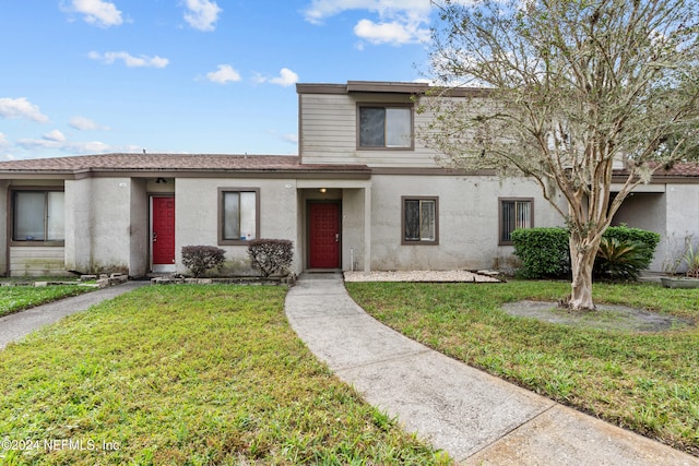 view of property with a front yard