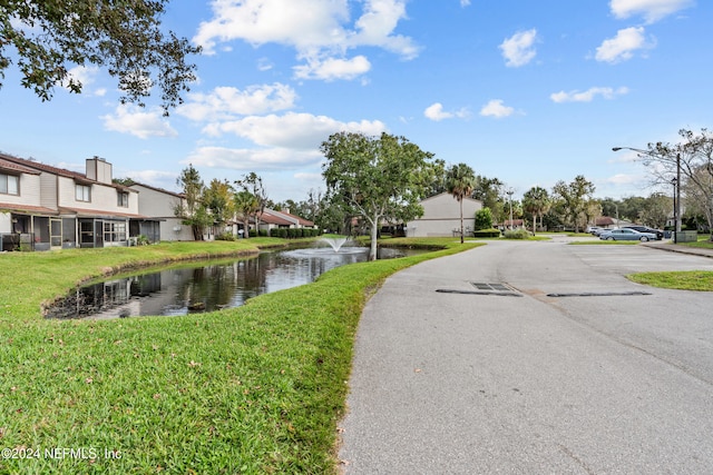 view of street featuring a water view