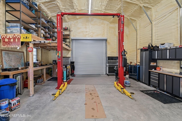 garage with a workshop area