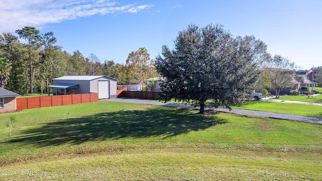 view of yard featuring a garage