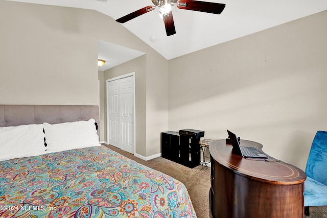 carpeted bedroom with a closet, ceiling fan, and lofted ceiling