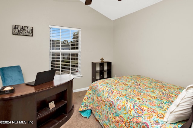 carpeted bedroom featuring ceiling fan and lofted ceiling