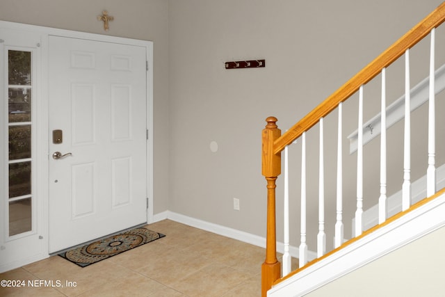 entryway featuring light tile patterned floors