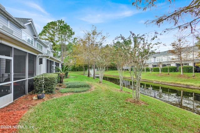 view of yard featuring a water view