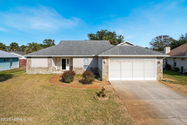 ranch-style home featuring a garage and a front yard