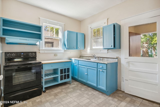 kitchen with blue cabinetry, ventilation hood, black / electric stove, and sink