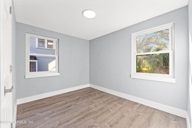 empty room with light wood-type flooring