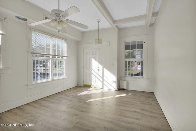 interior space with beam ceiling, ceiling fan, and light hardwood / wood-style floors