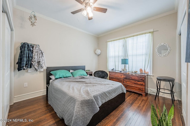 bedroom featuring dark hardwood / wood-style floors, ceiling fan, and ornamental molding