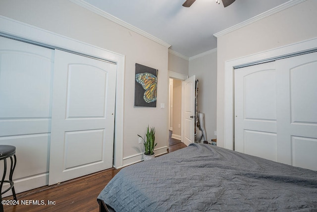 bedroom featuring ceiling fan, dark hardwood / wood-style floors, and ornamental molding