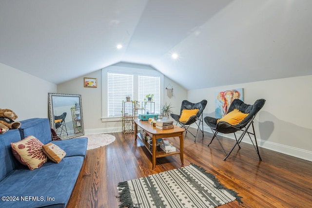 sitting room featuring hardwood / wood-style flooring and vaulted ceiling