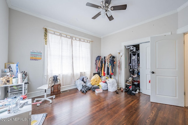 miscellaneous room featuring dark hardwood / wood-style flooring, ceiling fan, and crown molding