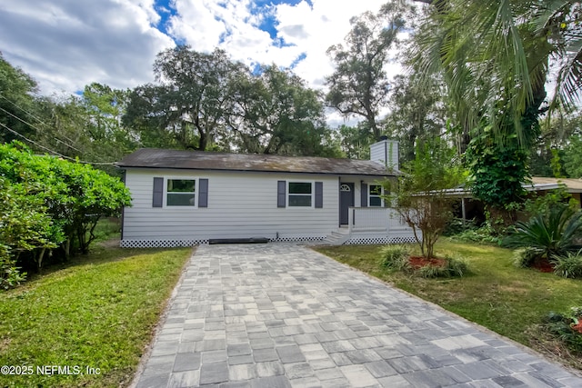 view of front of house with a front yard