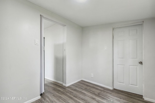 spare room featuring hardwood / wood-style flooring