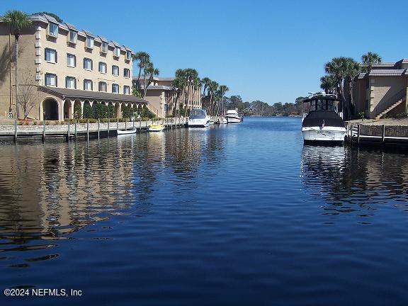 property view of water with a boat dock