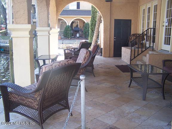 view of patio / terrace featuring french doors