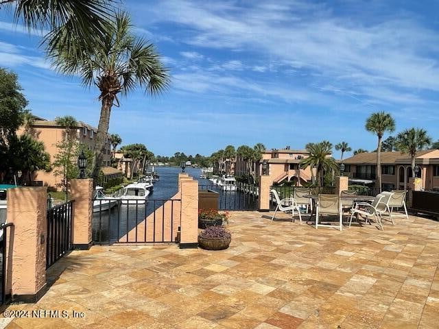 view of patio / terrace with a water view