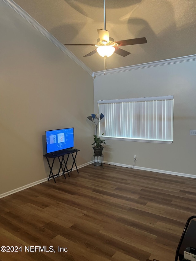 interior space featuring dark hardwood / wood-style floors, ceiling fan, and ornamental molding