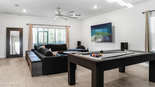 rec room with ceiling fan, light wood-type flooring, and pool table