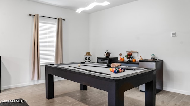 rec room featuring billiards and light hardwood / wood-style flooring