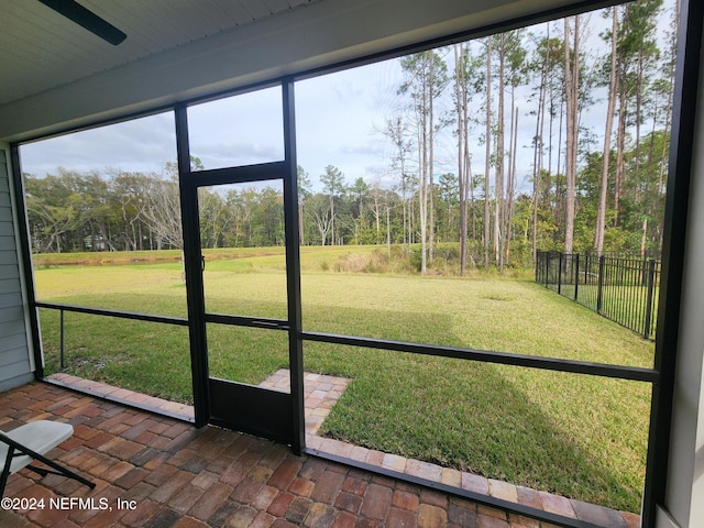 unfurnished sunroom featuring a healthy amount of sunlight