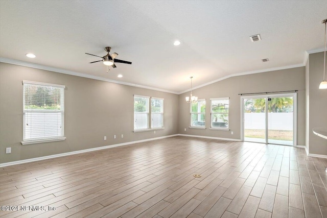 empty room featuring a wealth of natural light and light hardwood / wood-style flooring