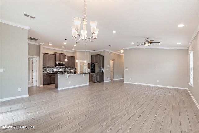 unfurnished living room with light hardwood / wood-style flooring and ornamental molding