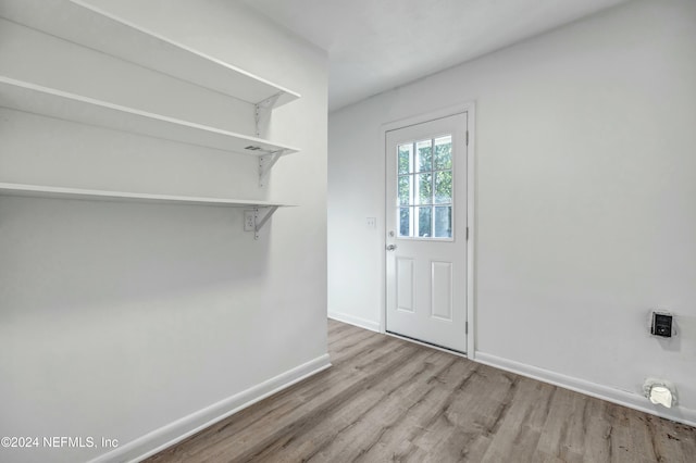 doorway with light hardwood / wood-style floors