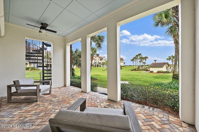 view of patio / terrace featuring ceiling fan