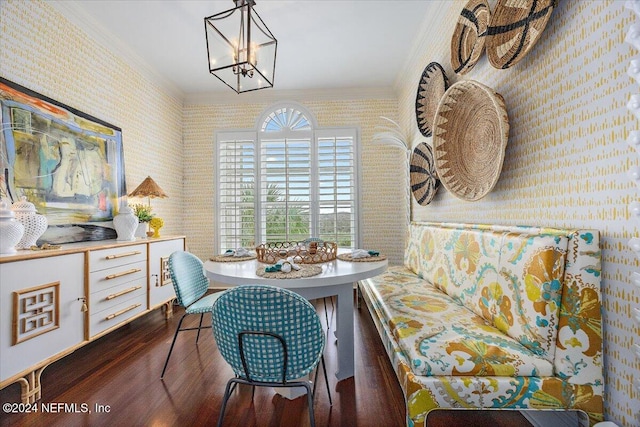 home office with crown molding, dark hardwood / wood-style floors, and an inviting chandelier