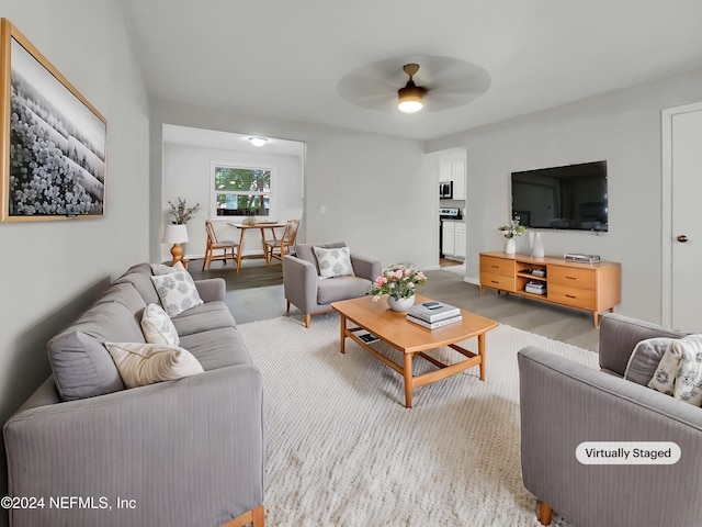 living room with ceiling fan