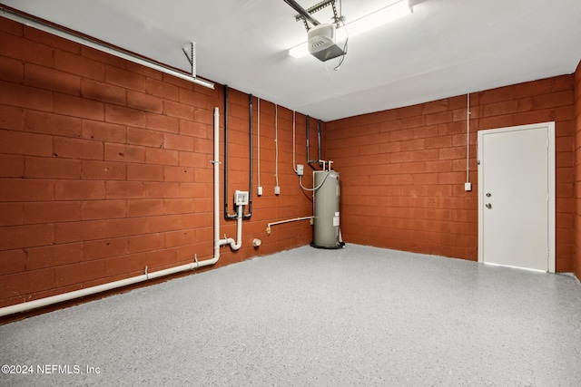 garage with electric water heater and a garage door opener