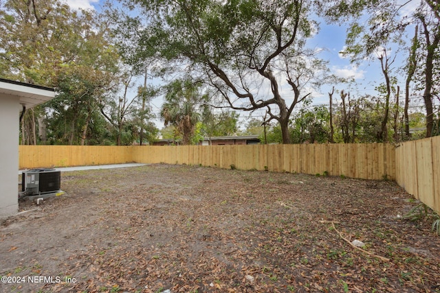 view of yard featuring central AC unit