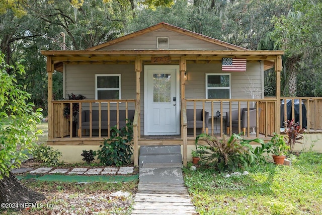 bungalow-style house featuring covered porch