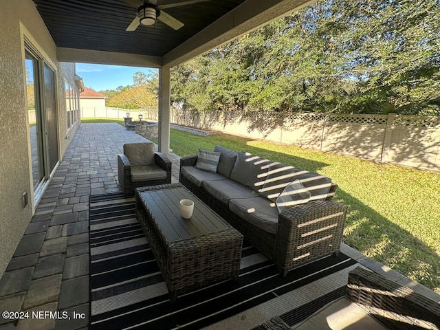 view of patio featuring ceiling fan and an outdoor hangout area