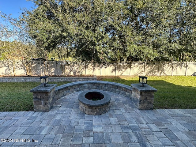 view of patio / terrace featuring a fire pit