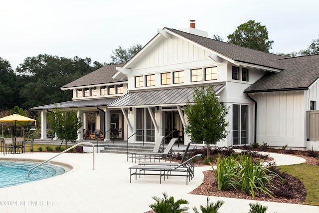 back of house featuring a patio area