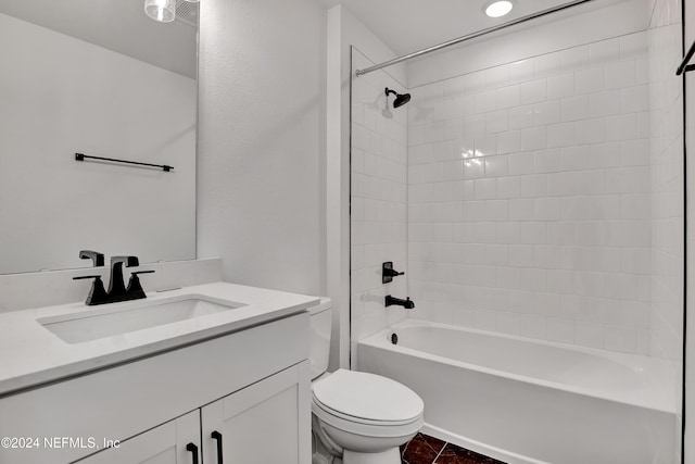 full bathroom featuring tile patterned floors, toilet, vanity, and tub / shower combination