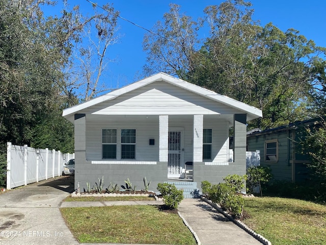 bungalow-style home with a porch