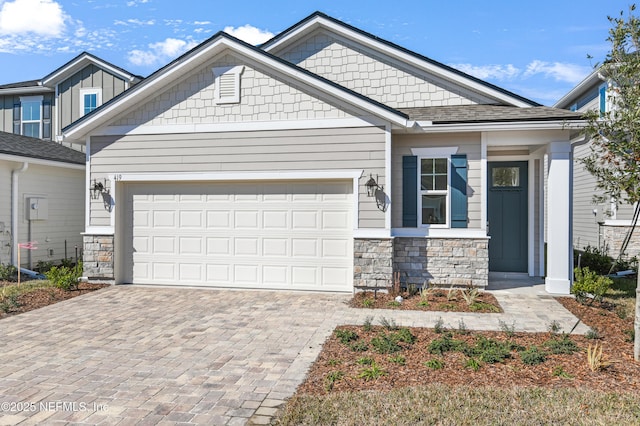 craftsman inspired home featuring a garage